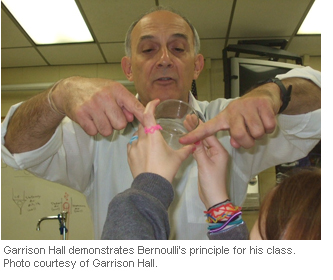 Garrison Hall demonstrates Bernoullis principle for his class. Photo courtesy of Garrison Hall.