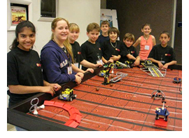Image of some children participating in the West Virginia Robotics Tournament.