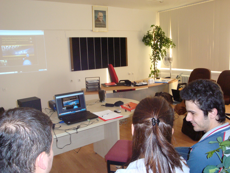 Students await the beginning of the videoconference.